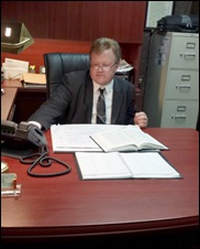 Tom Tabor in his office working